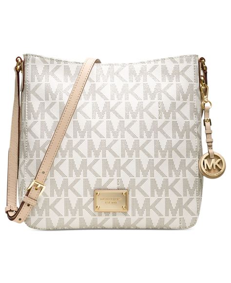 white and gold michael kors bag|Michael Kors white floral bag.